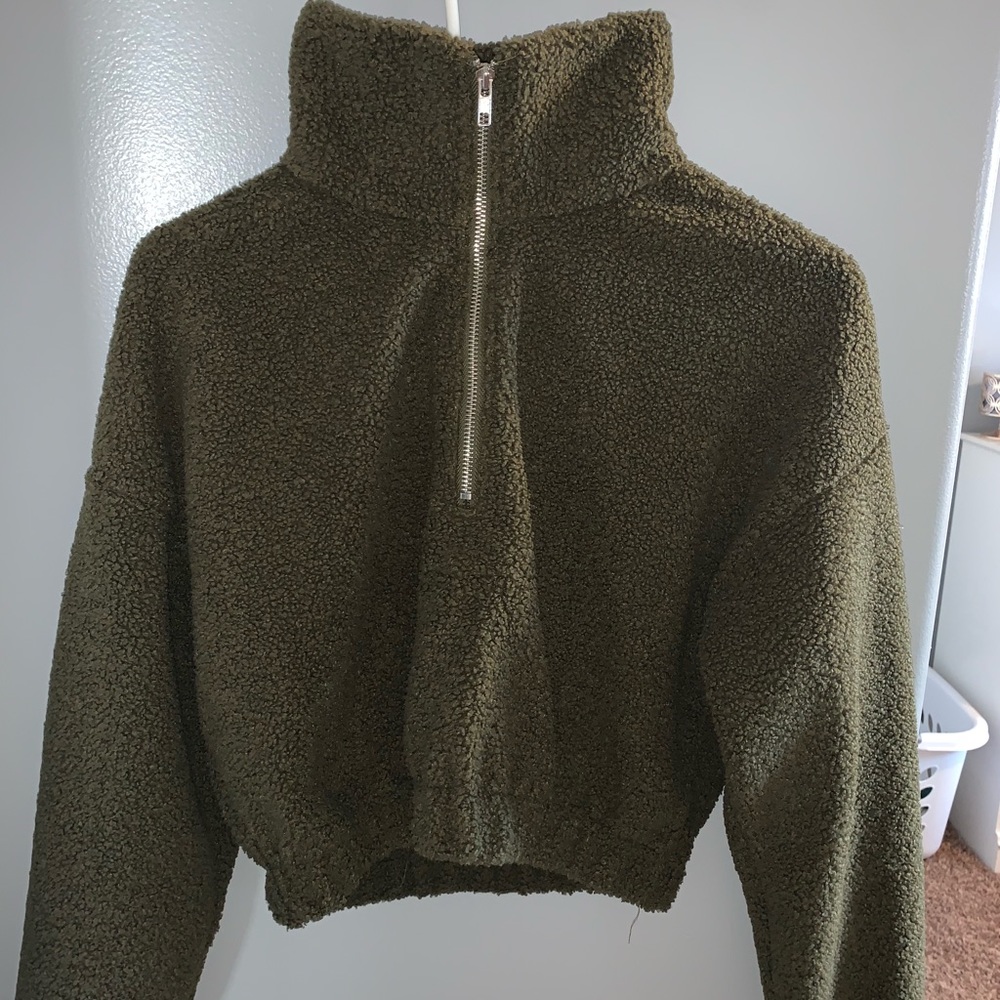 green pullover